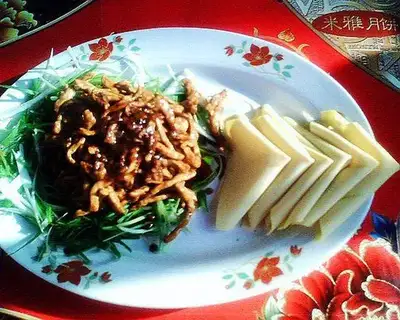Shredded pork in Beijing sauce