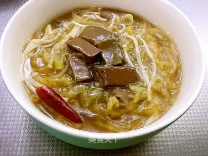 Sour duck blood powder soup