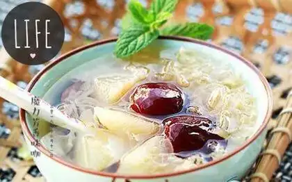 Silver spoons of fresh fruit