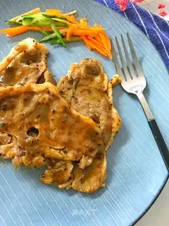 Fried black pepper lamb butterflies