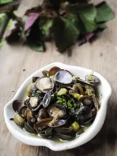 stir-fried clams with pickled pepper and perilla