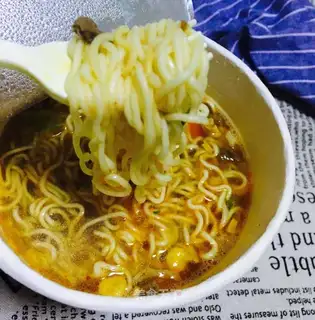 Master Kang is burning beef noodles