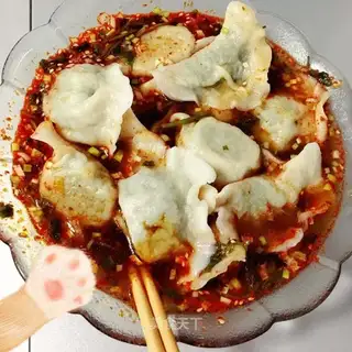 Sour soup and veggie dumplings