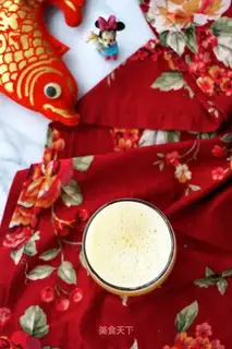 An orange apple beverage