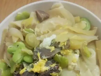 Hands on egg noodles