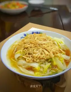 Big cabbage with golden needle mushrooms