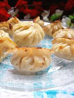 Fried dumplings with potatoes and fresh meat