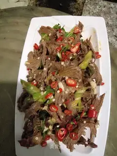 Hands to the heart of a pig
