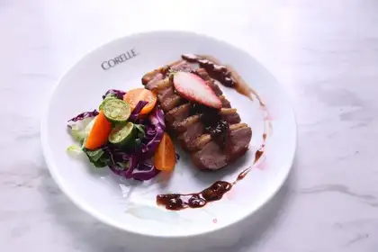 Strawberry sauce, black curd duck