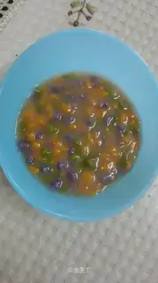 The baby eats vegetable noodles