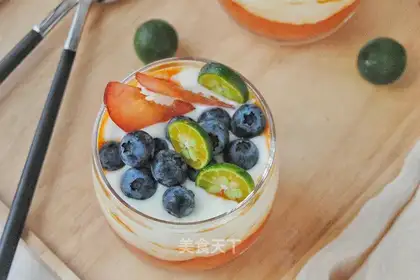 A papaya yogurt cup