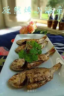 Roasted small sea fish with cumin