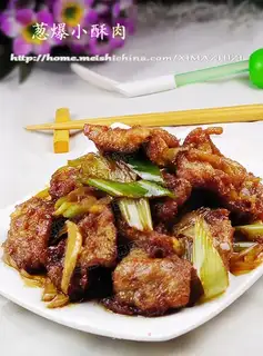 Sauteed crispy pork with spring onions