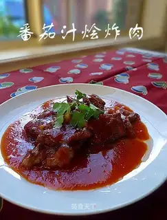 Fried pork with tomato sauce
