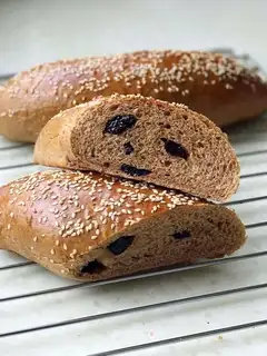 Black gallons of pecan bread