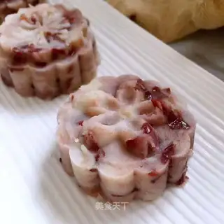 The baby eats red beans