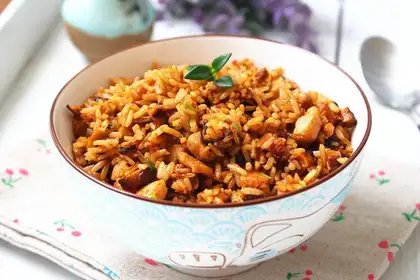 Fries, chicken sauce, fried rice