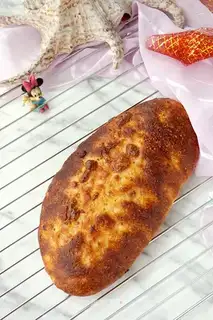 A fermented potato cheese onion bread