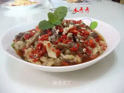 Fresh red pepper with a steamed eggplant