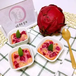The baby eats the fruit
