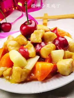 Diced chicken with orange juice and mixed fruits