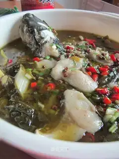 Spicy fish with pickled cabbage