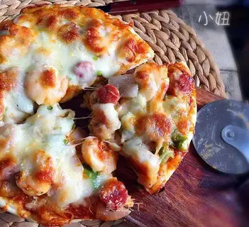 Shrimp sausage pizza