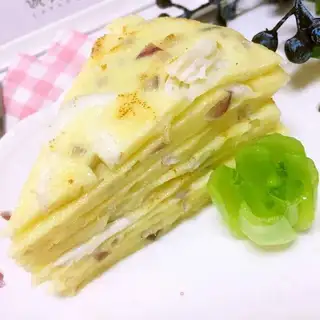 Baby eats silver fish eggcakes