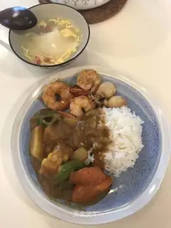 Burn seafood curry