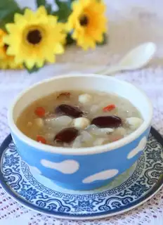A silver spoon with dates