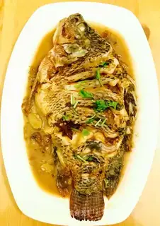 A red-burned tilapia