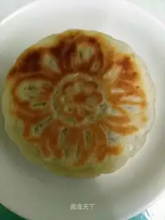 A pancake. A handmade moon cake