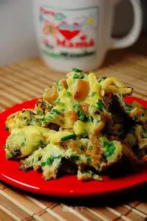 Pan-fried preserved egg with vegetable