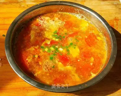 A small restaurant with tomato egg soup