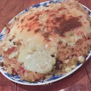 Cheese and potatoes and chicken