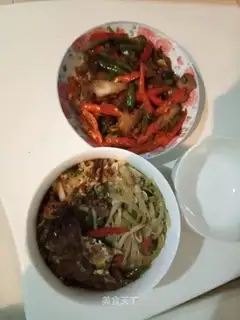Two peppers and five flowers