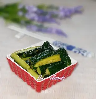 pickled melon strips in sauce