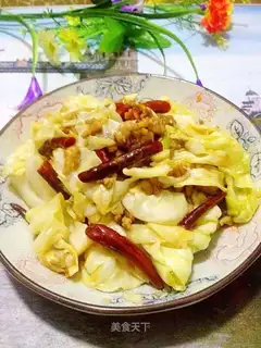 The hand tore the cabbage