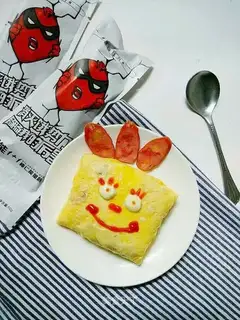 Cartoon sausage omelet