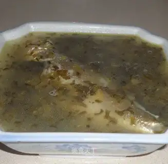 Salted chicken and yellow croaker in large soup