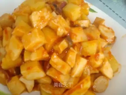 Stewed potatoes with mushroom in tomato sauce