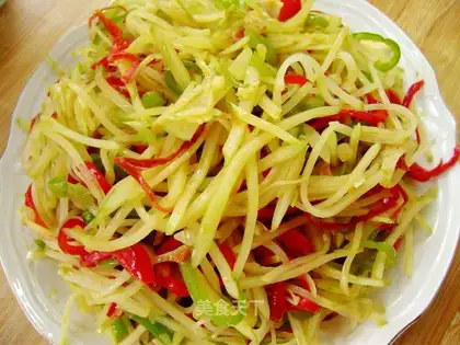 Shredded potatoes with green and red pepper