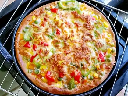 A quail egg and a pizza