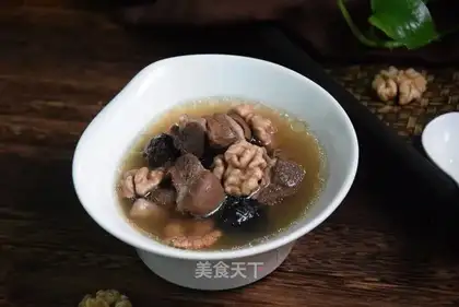 Nuts, dates, lamb soup