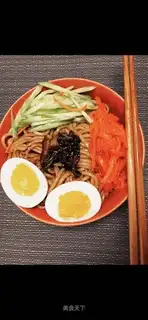 A bowl of warm onion noodles