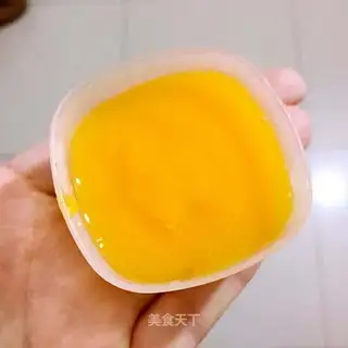 Baby eats pumpkin mud