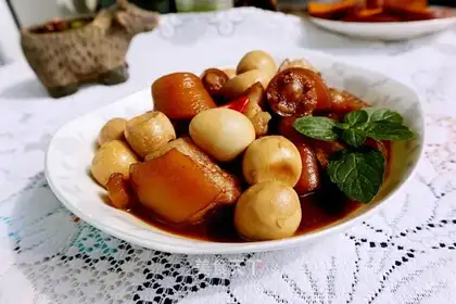Porktail with quail eggs