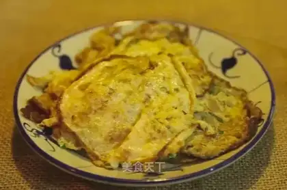 Onion casserole and fried eggs