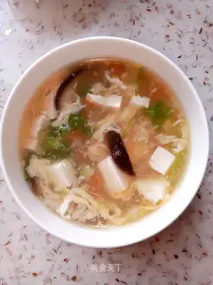 Tomato egg tofu soup