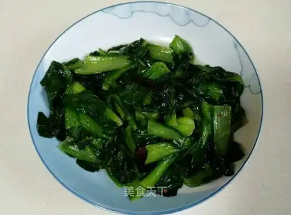 The new girl's cooking the greens